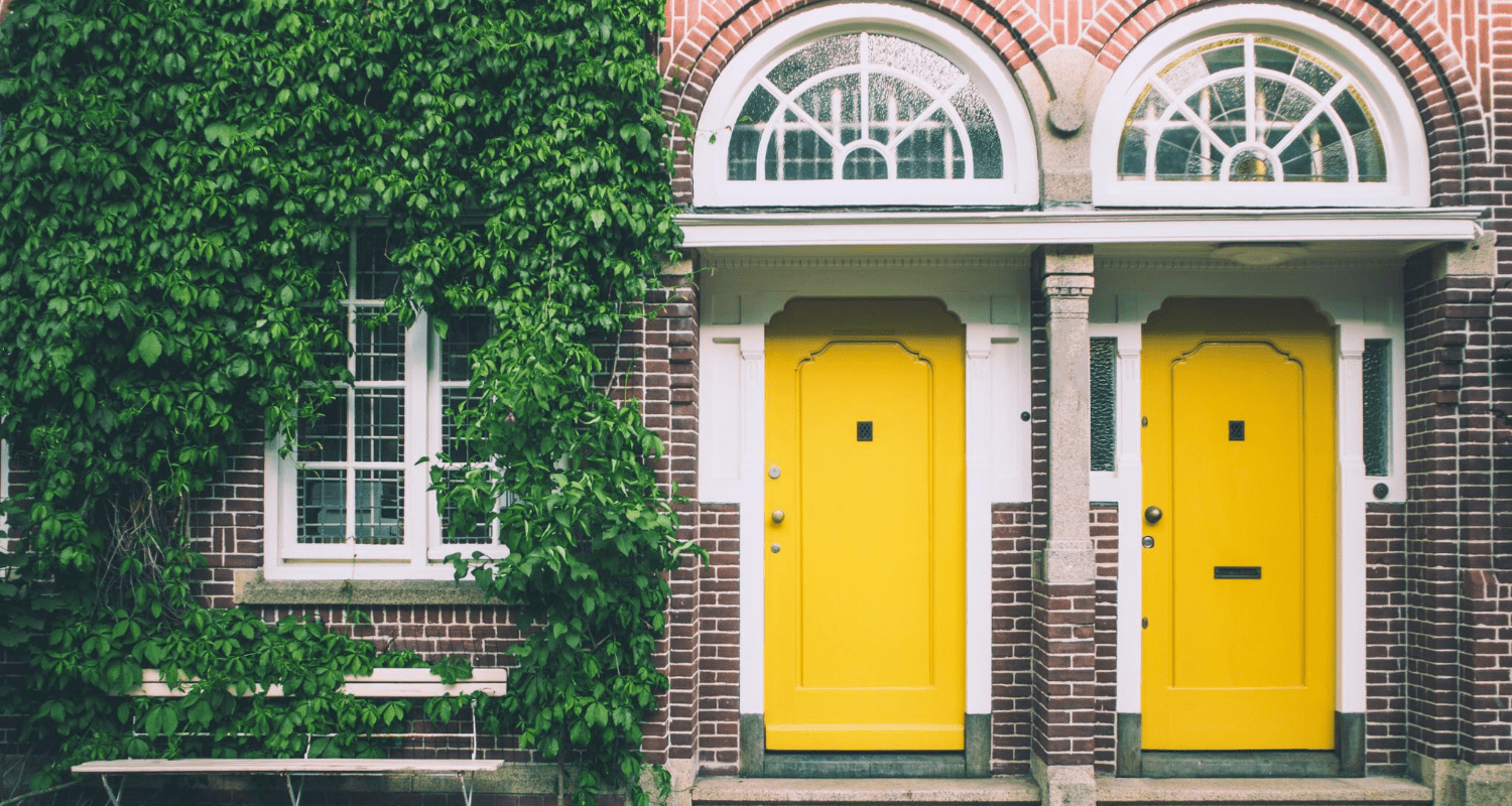 two yellow front doors