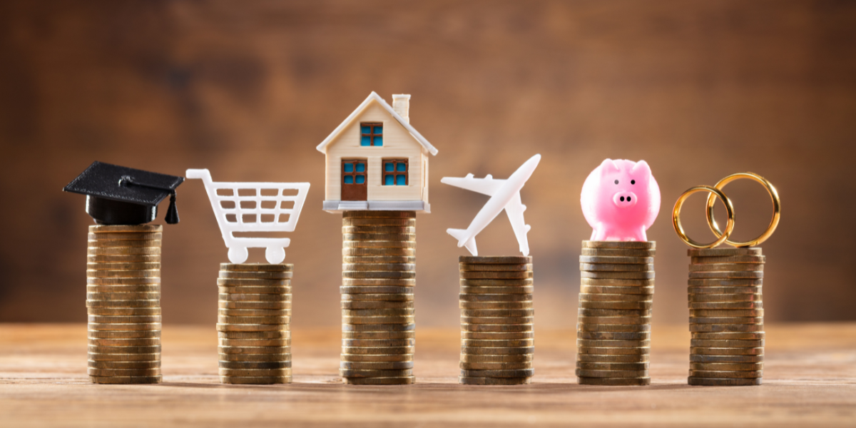 stacks of coins with different figurines on top